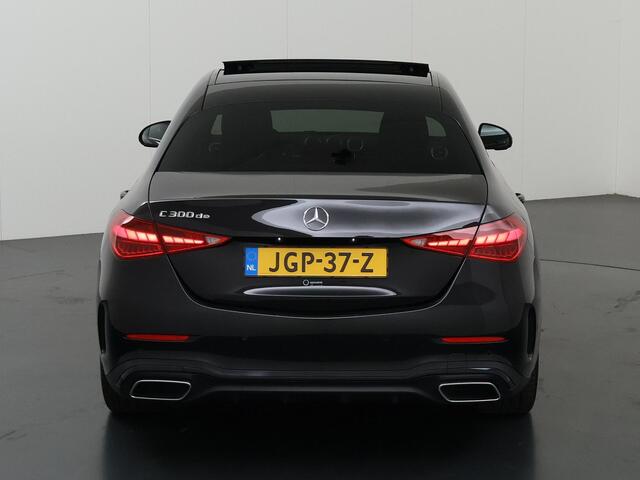 Mercedes-Benz C-KLASSE 300 de Business Solution AMG | Night | Panoramadak | Memory | Digital Light | Sfeerverlichting | Stoelverwarming | Multispaaks lichtmetalen velgen |