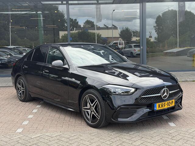 Mercedes-Benz C-KLASSE 300 e Business Solution Luxury PANORAMADAK | BURMESTER | DODEHOEK DETECTIE | CRUISE CONTROL | 360-CAMERA | SFEERVERLICHTING | ELEKTRISCHE STOELEN | STOELVERWARMING | NAVIGATIE