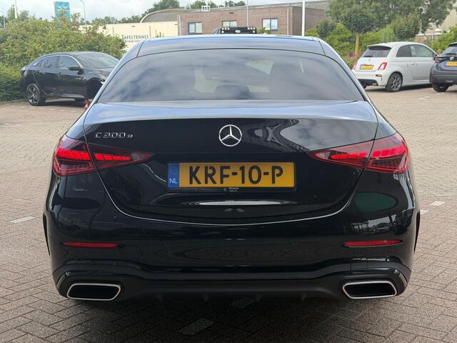 Mercedes-Benz C-KLASSE 300 e Business Solution Luxury PANORAMADAK | BURMESTER | DODEHOEK DETECTIE | CRUISE CONTROL | 360-CAMERA | SFEERVERLICHTING | ELEKTRISCHE STOELEN | STOELVERWARMING | NAVIGATIE