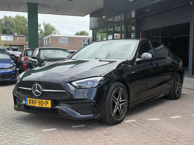 Mercedes-Benz C-KLASSE 300 e Business Solution Luxury PANORAMADAK | BURMESTER | DODEHOEK DETECTIE | CRUISE CONTROL | 360-CAMERA | SFEERVERLICHTING | ELEKTRISCHE STOELEN | STOELVERWARMING | NAVIGATIE