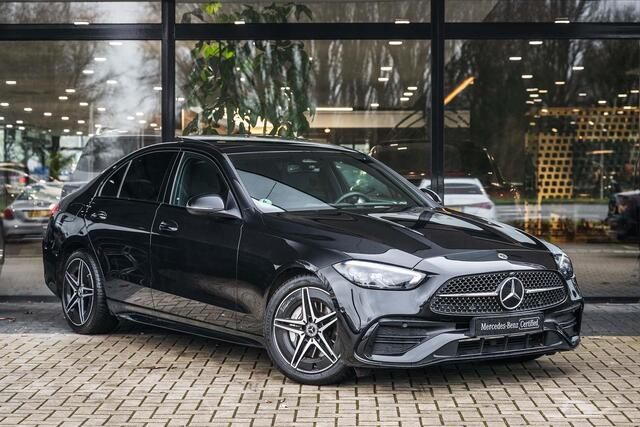 Mercedes-Benz C-KLASSE 180 AMG Line | Achteruitrijcamera | Panorama-schuifdak | Sfeerverlichting | Nightpakket | Stoelverwarming