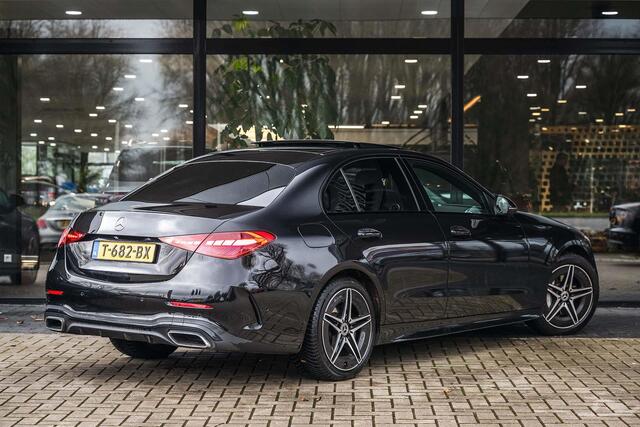 Mercedes-Benz C-KLASSE 180 AMG Line | Achteruitrijcamera | Panorama-schuifdak | Sfeerverlichting | Nightpakket | Stoelverwarming