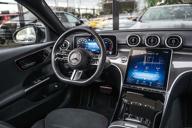 Mercedes-Benz C-KLASSE 180 AMG Line | Achteruitrijcamera | Panorama-schuifdak | Sfeerverlichting | Nightpakket | Stoelverwarming