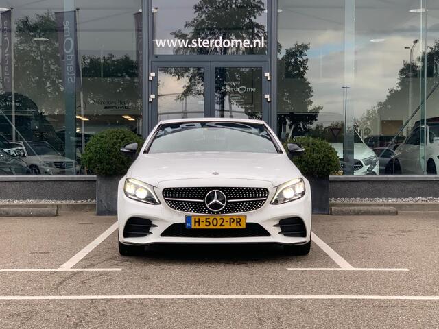 Mercedes-Benz C-KLASSE Cabrio 300 Premium AMG Plus Pack l 259 PK l Memory pakket l MULTIBEAM LED l Aircap & Airscarf l MBUX l Head Up l 360 gr Camera l BURMESTER l Stoelverwarming l Sfeerverlichting l Alarm 3 l Tempomaat l Nightpakket l Spiegel pakket l Nederlands geleverd l De