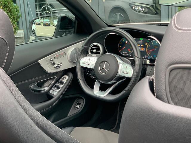 Mercedes-Benz C-KLASSE Cabrio 300 Premium AMG Plus Pack l 259 PK l Memory pakket l MULTIBEAM LED l Aircap & Airscarf l MBUX l Head Up l 360 gr Camera l BURMESTER l Stoelverwarming l Sfeerverlichting l Alarm 3 l Tempomaat l Nightpakket l Spiegel pakket l Nederlands geleverd l De