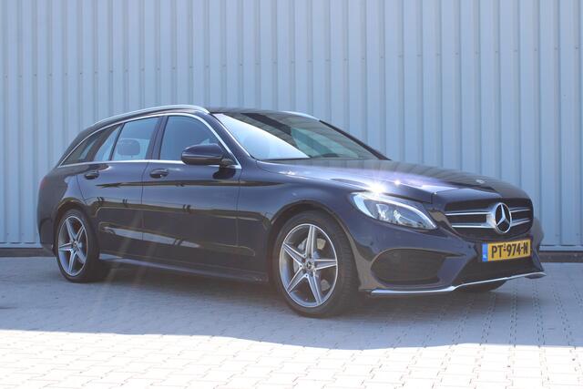 Mercedes-Benz C-KLASSE Estate 180 Business Solution AMG | Incl. 12 maanden garantie | Lederen sportstoelen | Cruise control | Climate control | Trekhaak | Zwarte hemel | LED Koplampen | 18" LM | Elektrische achterklep | Achteruitrijcamera | Dodehoek detectie |