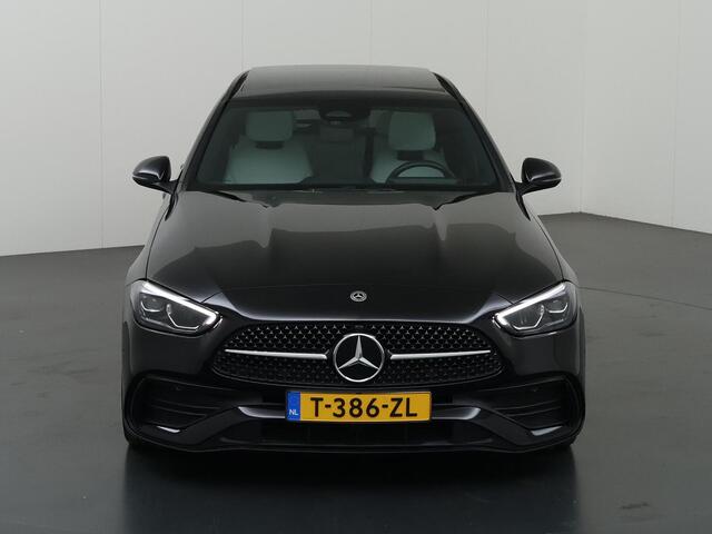 Mercedes-Benz C-KLASSE Estate 180 AMG NIGHT | Panoramadak | Stoelmemory | Achteruitrijcamera | LED High Performance koplampen | Lichte Bekleding | Sfeerverlichting |