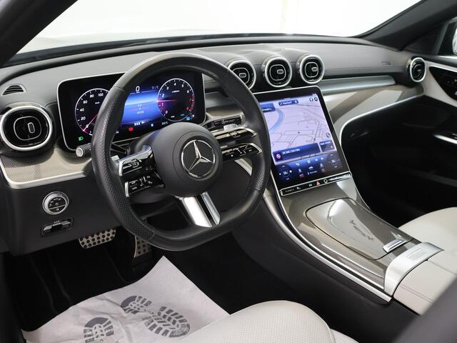 Mercedes-Benz C-KLASSE Estate 180 AMG NIGHT | Panoramadak | Stoelmemory | Achteruitrijcamera | LED High Performance koplampen | Lichte Bekleding | Sfeerverlichting |
