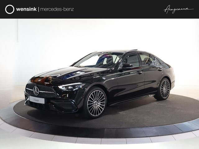 Mercedes-Benz C-KLASSE 300e Business Solution AMG | Panoramaschuifdak | Nightpakket | Digital Light | 19" LM velgen | Dodehoekassistent | 360° camera | Stoelverwarming | Sfeerverlichting |