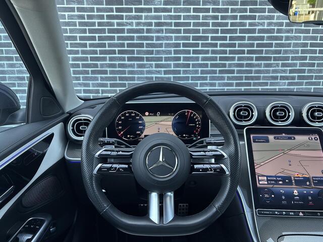 Mercedes-Benz C-KLASSE Estate 300 e AMG Line | Panoramadak | Stoelverwarming | Cruise Control Adaptief | MBUX Navigatie | Achteruitrijcamera | Parkeersensoren | LED Koplampen | Elektrische Achterklep | Plug-in Hybrid (PHEV)