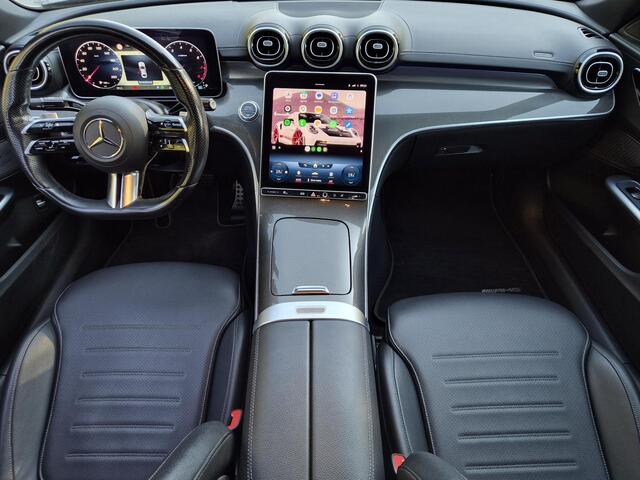 Mercedes-Benz C-KLASSE 200 Launch Edition AMG Line / Trekgewicht 1.800 kg / Wegklapbare trekhaak / Glazen schuif- en kanteldak / Cruise control / Achteruitrijcamera / Stoelverwarming / Climate control / Apple Carplay Android Auto /