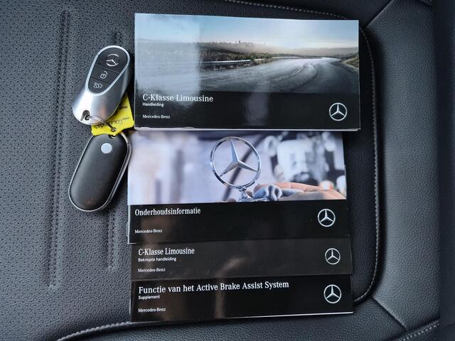 Mercedes-Benz C-KLASSE 200 Launch Edition AMG Line / Trekgewicht 1.800 kg / Wegklapbare trekhaak / Glazen schuif- en kanteldak / Cruise control / Achteruitrijcamera / Stoelverwarming / Climate control / Apple Carplay Android Auto /