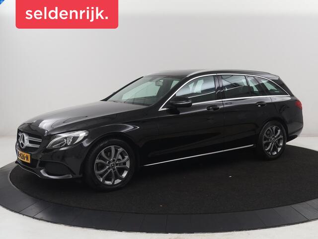 Mercedes-Benz C-KLASSE Estate 180 Business Solution | Half leder | Stoelverwarming | Navigatie | Bluetooth | Camera | Park assist | Cruise control | Climate control | Elektrische achterklep | Trekhaak