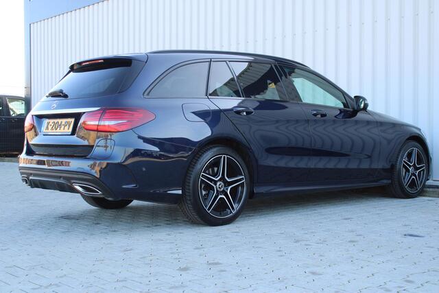 Mercedes-Benz C-KLASSE Estate 300 e Business Solution AMG Limited | Incl. 12 maanden garantie | Apple CarPlay | 360° camera | Sportstoelen met verwarming | Alcantara | DAB | Draadloos laden | Zwarte hemel | Elektrische Achterklep | Cruise control |