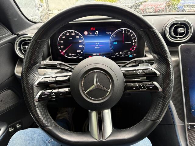 Mercedes-Benz C-KLASSE 300 e AMG Line | Panoramadak | Stoelverwarming | 360 Camera | Memory Seats | Dodehoekdetectie | Keyless | Ambiance Verlichting | Cruise Control | Navigatie | Leer