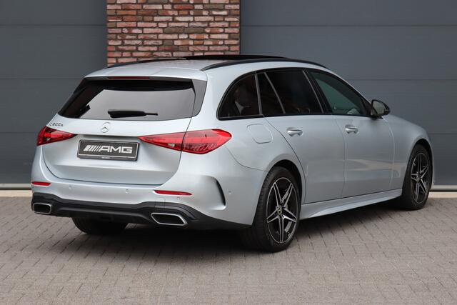 Mercedes-Benz C-KLASSE Estate 300 e AMG Line | Panoramadak | Burmester | Distronic | Memory | Leder | Trekhaak | Digital Light | HUD | Surround Camera |