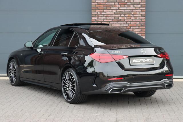 Mercedes-Benz C-KLASSE 400 e 4MATIC AMG Line | Distronic+ | Panoramadak | Nappa Leder | Burmester | Memory | Digital Light | HUD | Verwarmd Stuurwiel | Keyless Go | Surround Camera |