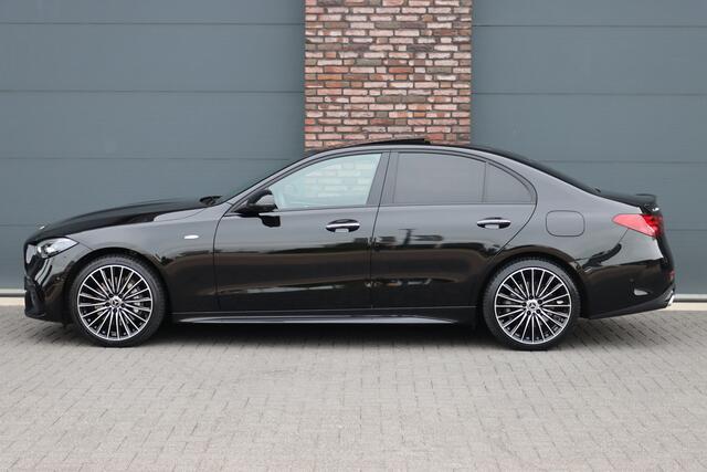 Mercedes-Benz C-KLASSE 400 e 4MATIC AMG Line | Distronic+ | Panoramadak | Nappa Leder | Burmester | Memory | Digital Light | HUD | Verwarmd Stuurwiel | Keyless Go | Surround Camera |
