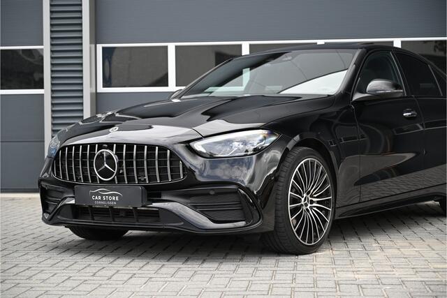 Mercedes-Benz C-KLASSE 300e AMG / SCHUIFDAK / C63 / LEDER / CAMERA / SFEERVERLICHTING / LED / 19"