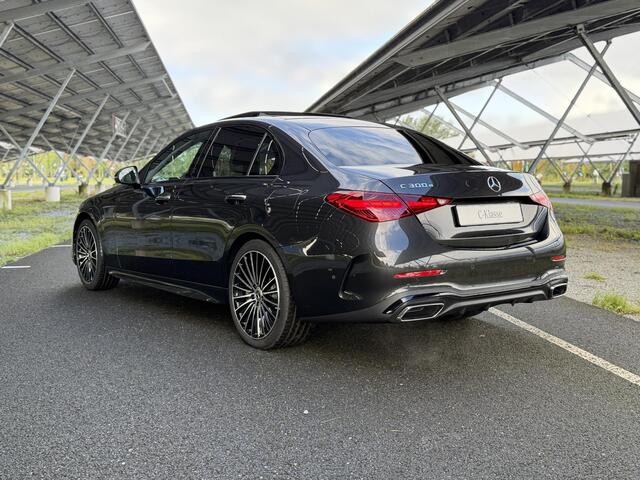 Mercedes-Benz C-KLASSE 300e 140 Years Edition | AMG line | Night | Panoramadak | Trekhaak | Winter pakket | Memory stoelen | Sfeerverlichting |