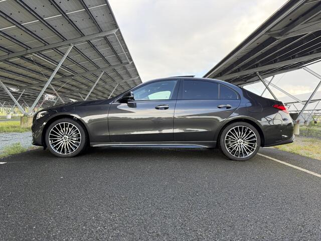 Mercedes-Benz C-KLASSE 300e 140 Years Edition | AMG line | Night | Panoramadak | Trekhaak | Winter pakket | Memory stoelen | Sfeerverlichting |