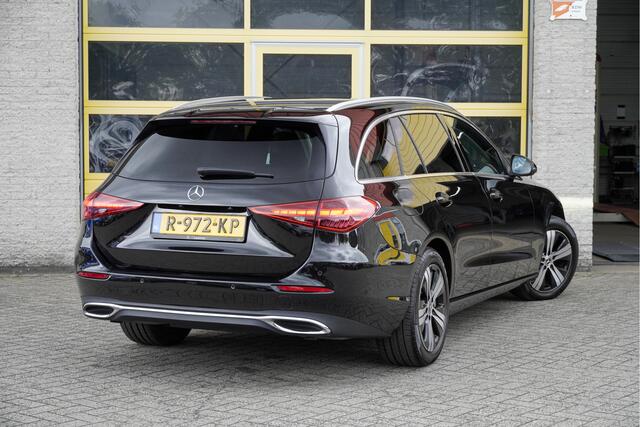 Mercedes-Benz C-KLASSE Estate 300 e 204PK! Automaat Luxury Line Limited BJ2022 Lmv 17" | Led V+A | Pdc | Elek. achterklep | Achteruitrijcamera | App-Connect | Navi | Virtual cockpit | Sfeerverlichting | Cruise control | Verwarmde voorstoelen | Nw-model! | SoH 94.6% + 2 laadkabels!