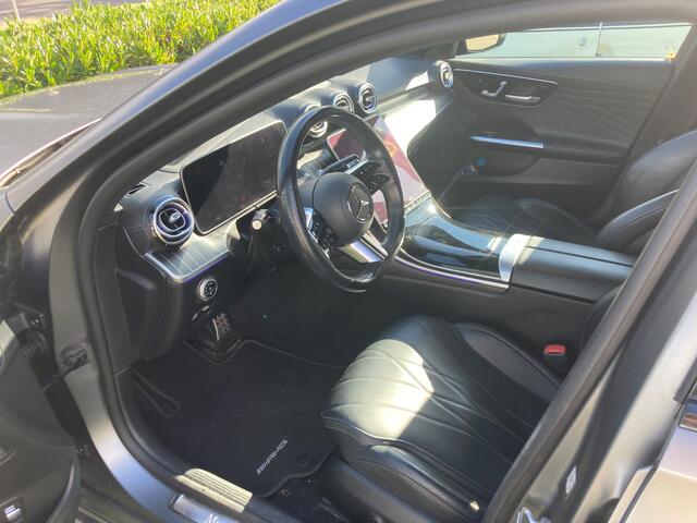 Mercedes-Benz C-KLASSE 300 e AMG Line | Magno | Panoramadak | Stoelverwarming | Adaptive Cruise Control | Dodehoekdetectie | Head-Up Display | Memory Seat | 360 Camera | Keyless | Ambiance Verlichting | Navigatie | Apple Carplay