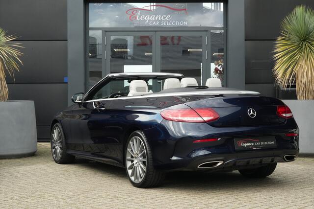Mercedes-Benz C-KLASSE Cabrio 400 4MATIC AMG Prestige | 334PK | Burmester | Airscarf | 360° | Een bijzonder fraaie Mercedes-Benz C 400 4MATIC Cabriolet met de krachtige 3.0 liter V6-benzinemotor, goed voor maar liefst 334 PK en 480 Nm koppel. Dankzij de 4MATIC vierwielaandrijving en d