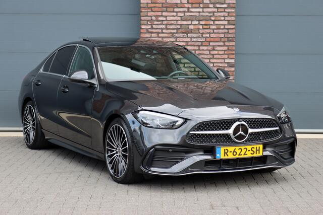 Mercedes-Benz C-KLASSE 200 AMG Line | Panoramadak | Distronic+ | Camera | Sfeerverlichting Premium | Zitcomfortpakket | Stoelverwarminig | Geluidsisolerend Glas |