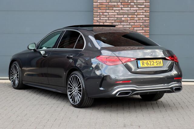 Mercedes-Benz C-KLASSE 200 AMG Line | Panoramadak | Distronic+ | Camera | Sfeerverlichting Premium | Zitcomfortpakket | Stoelverwarminig | Geluidsisolerend Glas |