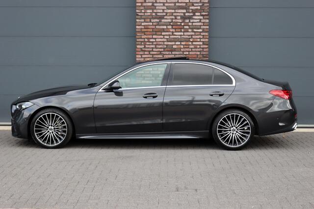 Mercedes-Benz C-KLASSE 200 AMG Line | Panoramadak | Distronic+ | Camera | Sfeerverlichting Premium | Zitcomfortpakket | Stoelverwarminig | Geluidsisolerend Glas |