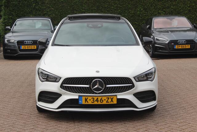 Mercedes-Benz CLA-KLASSE 180 Business Solution AMG / Panoramadak / Camera / 19'' / Sfeerverlichting / Leder&Alcantara / Cruise Control