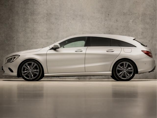 Mercedes-Benz CLA-KLASSE Shooting Brake 180 AMG Sport Automaat (GROOT NAVI, LEDER, CAMERA, GETINT GLAS, STOELVERWARMING, PORTSTOELEN, PARKEERSENSOREN, CRUISE, ZWART HEMEL, NIEUWE APK, NIEUWSTAAT)