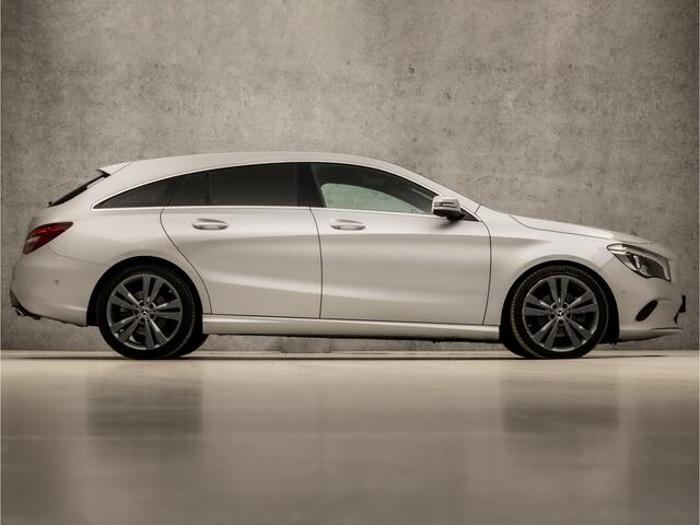 Mercedes-Benz CLA-KLASSE Shooting Brake 180 AMG Sport Automaat (GROOT NAVI, LEDER, CAMERA, GETINT GLAS, STOELVERWARMING, PORTSTOELEN, PARKEERSENSOREN, CRUISE, ZWART HEMEL, NIEUWE APK, NIEUWSTAAT)