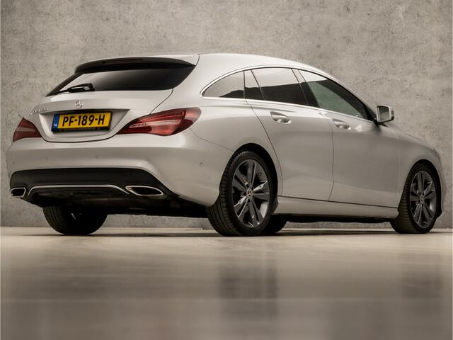 Mercedes-Benz CLA-KLASSE Shooting Brake 180 AMG Sport Automaat (GROOT NAVI, LEDER, CAMERA, GETINT GLAS, STOELVERWARMING, PORTSTOELEN, PARKEERSENSOREN, CRUISE, ZWART HEMEL, NIEUWE APK, NIEUWSTAAT)