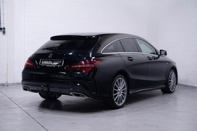 Mercedes-Benz CLA-KLASSE Shooting Brake 180 business Edition lederen bekleding navigatie PDC v+a sportstoelen stoelverwarming carbon inlegdelen led-high performance verlichting trekhaak 18"LMV private-glas cruise controle schakelflippers aan het stuur