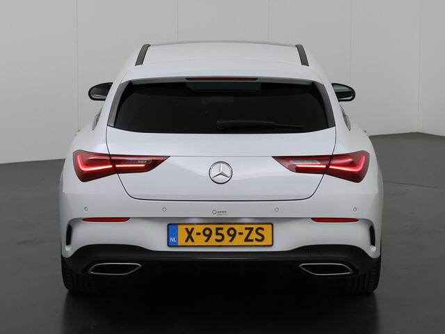 Mercedes-Benz CLA-KLASSE 180 Shooting Brake AMG Line Mercedes-Benz CLA 180 Shooting Brake 180 AMG Line | Panorama dak | Night Pakket | 19 inch | Digitaalwit | Sfeerverlichting
