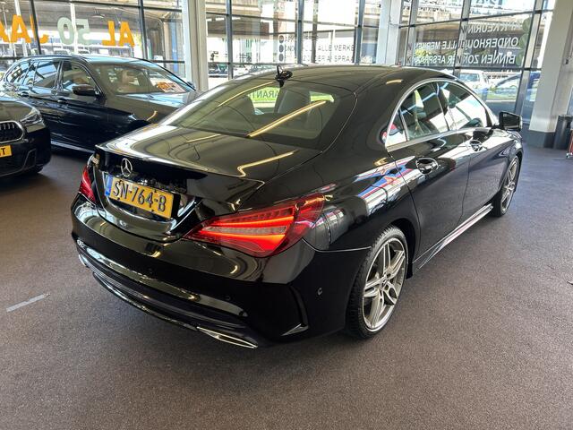 Mercedes-Benz CLA-KLASSE 180 Business Solution AMG | Automaat | Lederen/Alcantara bekleding | Cruise control | Adaptief onderstel | Elek. inklapbare spiegels | Navigatie | Stoelverwarming