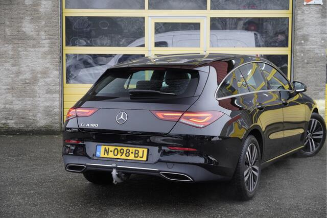 Mercedes-Benz CLA-KLASSE Shooting Brake 180 Automaat! Business Solution BJ2021 Lmv 17" | Led V+A | Pdc | Navi | Elek. trekhaak | Elek. achterklep | Achteruitrijcamera | Virtual cockpit | Climate control | Cruise control | Verwarmde voorstoelen | Sportstoelen | Zwarte hemel | Geti