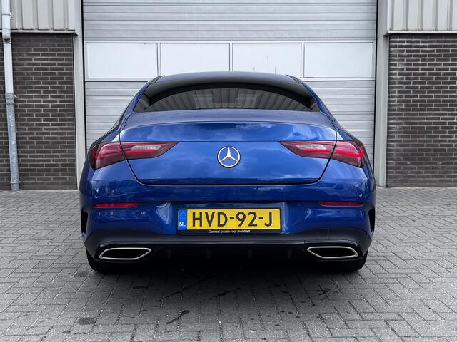Mercedes-Benz CLA-KLASSE 180 Business Solution AMG | Panoramadak | Bruin Interieur | Night Pakket | MULTIBEAM LED Koplampen | Apple CarPlay | Android Auto | Sierdelen Walnotenhout Zwart | Sfeerverlichting | Stoelverwarming | Achteruitrijcamera