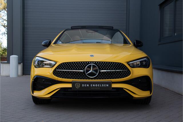 Mercedes-Benz CLE Coupé 300 e AMG Line | ACC | Pano | Burmester | NL Auto | Camera | Lane & Side Assist | Memory | Keyless Go | Apple & Android Carplay | Verkeersbordenherkenning | MBUX Premium | Led | Sfeerverlichting Premium | 19"| 313PK | Fabrieksgarantie 01/27