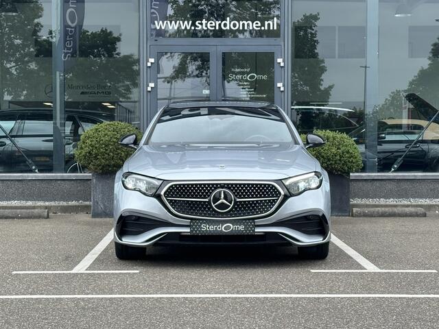 Mercedes-Benz E-KLASSE 300 e AMG Line l Nieuw model I Panoramadak l Distronic l Keyless Go l Sfeerverlichting l Stoelverwarming l Verwarmd stuurwiel l MBUX l Nightpakket I 5-spaaks I