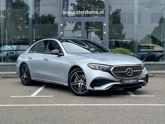 Mercedes-Benz E-KLASSE 300 e AMG Line l Nieuw model I Panoramadak l Distronic l Keyless Go l Sfeerverlichting l Stoelverwarming l Verwarmd stuurwiel l MBUX l Nightpakket I 5-spaaks I