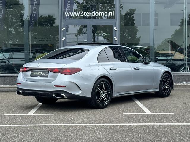Mercedes-Benz E-KLASSE 300 e AMG Line l Nieuw model I Panoramadak l Distronic l Keyless Go l Sfeerverlichting l Stoelverwarming l Verwarmd stuurwiel l MBUX l Nightpakket I 5-spaaks I