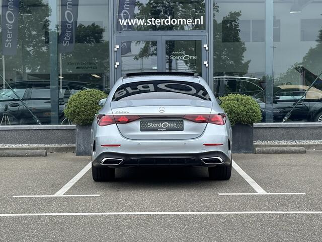 Mercedes-Benz E-KLASSE 300 e AMG Line l Nieuw model I Panoramadak l Distronic l Keyless Go l Sfeerverlichting l Stoelverwarming l Verwarmd stuurwiel l MBUX l Nightpakket I 5-spaaks I