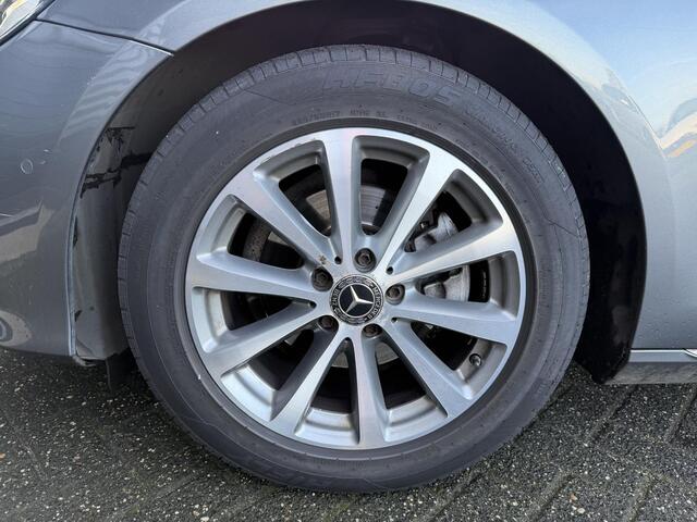 Mercedes-Benz E-KLASSE 220 d Business Solution | Widescreen | Sfeerverlichting | Navigatie | Lederen Bekleding | Stoelverwarming |