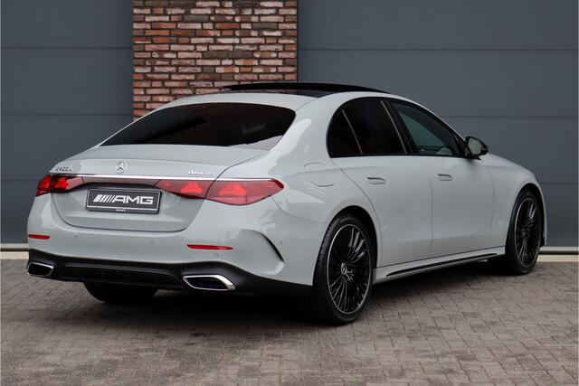 Mercedes-Benz E-KLASSE 400 e 4MATIC AMG Line | Hyperscreen | Luchtvering | Achterasbesturing | Distronic+ | HUD | Massage | Burmester | Nappa Leder | Trekhaak | Vlakkenverwarming | Stoelventilatie |