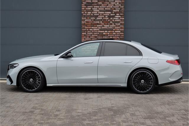 Mercedes-Benz E-KLASSE 400 e 4MATIC AMG Line | Hyperscreen | Luchtvering | Achterasbesturing | Distronic+ | HUD | Massage | Burmester | Nappa Leder | Trekhaak | Vlakkenverwarming | Stoelventilatie |