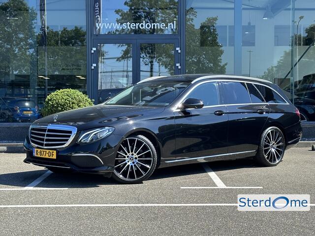 Mercedes-Benz E-estate 200 Premium Luxury l Panorama dak l Massage l Camera l Memorypakket l Stoelverwarming l Sfeerverlichting l Elek Trekhaak l l Elektrische achterklep l Led High Performance l Apple carplay l Dodehoekpakket I COMAND I DAB I Spiegelpakket I