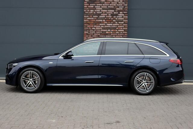 Mercedes-Benz E-estate 300 e Premium+ AMG Line | Airmatic | Hyperscreen | Distronic+ | Memory | Massage | Burmester | Stoelventilatie | 3D-Display | HUD | Verwarmd Stuurwiel | Trekhaak | Digital Light |